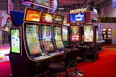 Live Mega Moolah game show studio with host and spinning wheel on akartoto login